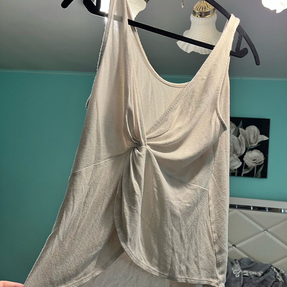Cream tank top with twist in back